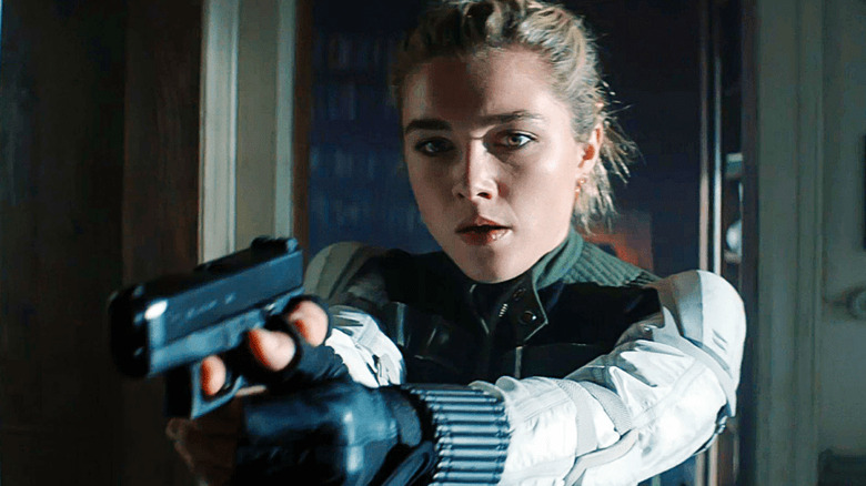 Yelena Belova holding gun