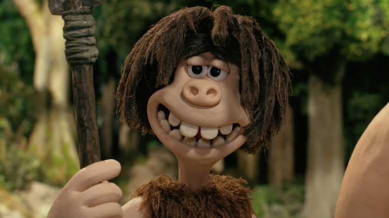 Early Man smiling