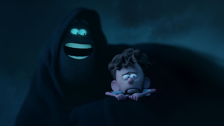 Dark holding a scared Orion in "Orion and the Dark" (2024)