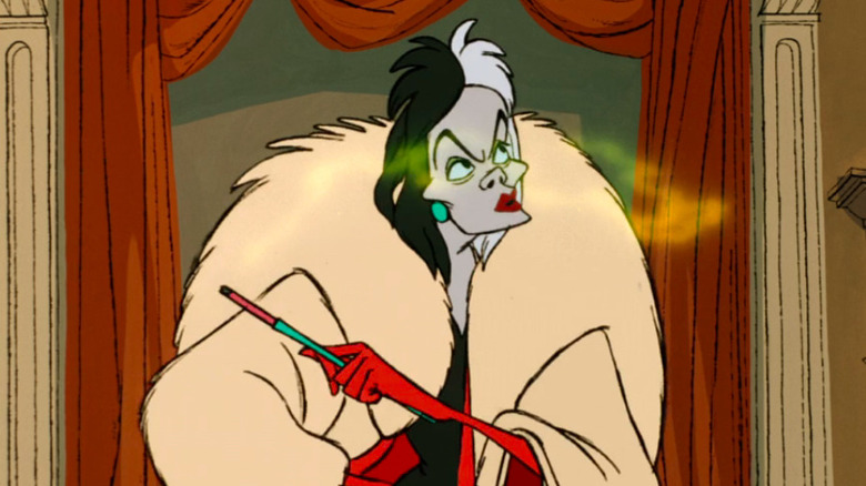 Cruella De Vil smoking and thinking in One Hundred and One Dalmatians