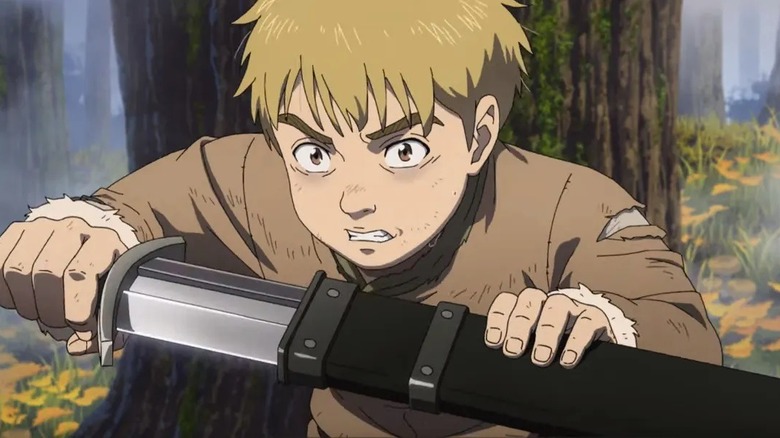 Young Thorfinn draws sword