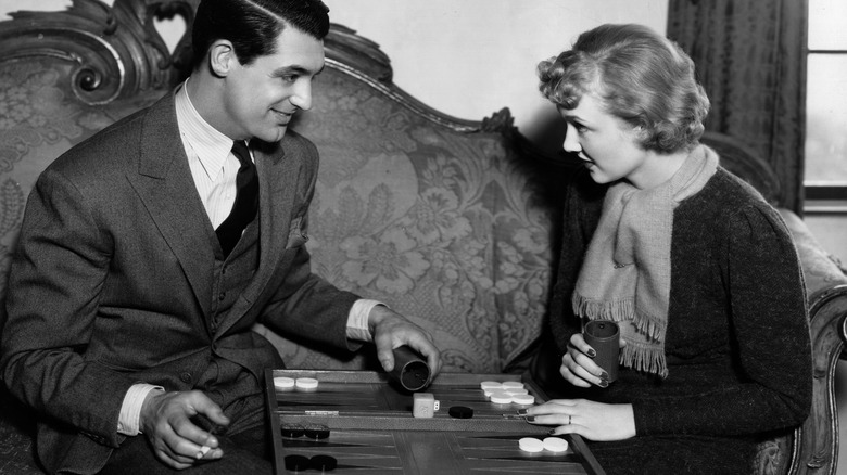 Cary Grant plays backgammon