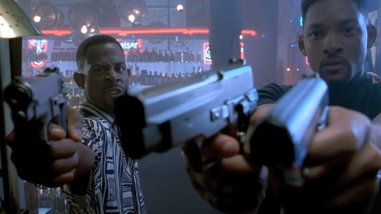 Will Smith and Martin Lawrence point guns