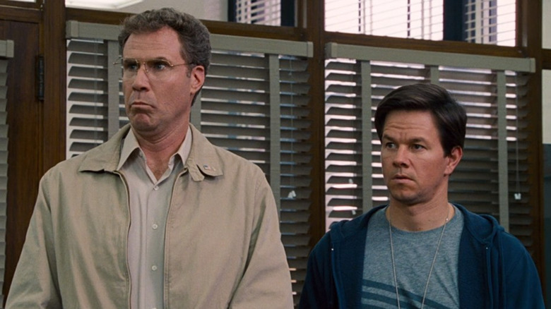 Mark Wahlberg and Will Ferrell listening