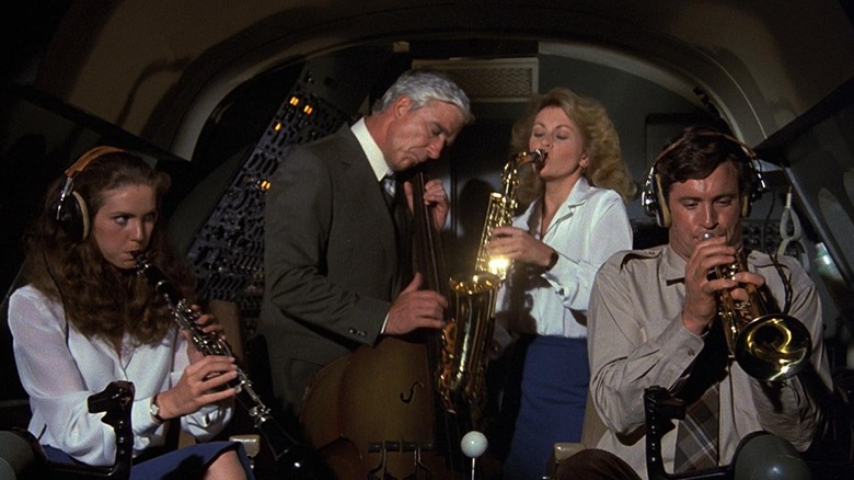 Airplane cast playing instruments