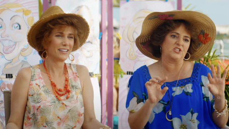 Kristen Wiig and Annie Mumolo wearing hats