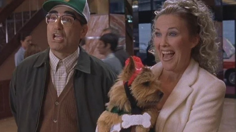 Eugene Levy and Catherine O'Hara with dog