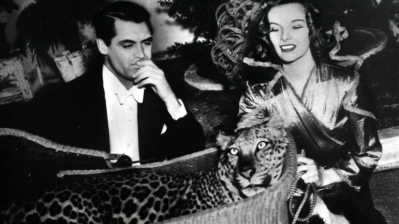 Katherine Hepburn and Cary Grant with leopard