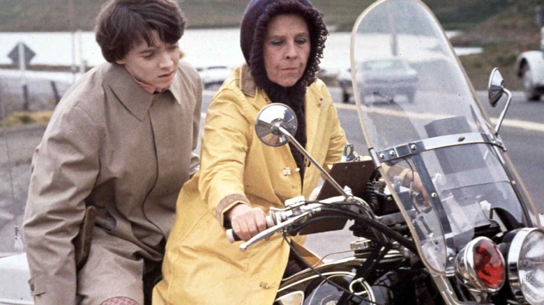 Bud Cort and Ruth Gordon riding bike