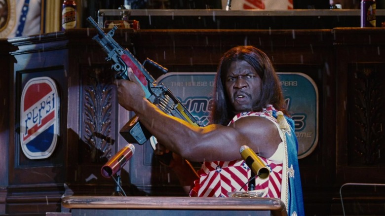 Terry Crews with machine gun