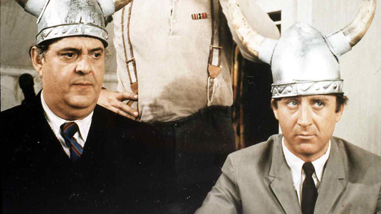 Gene Wilder and Zero Mostel wearing helmets