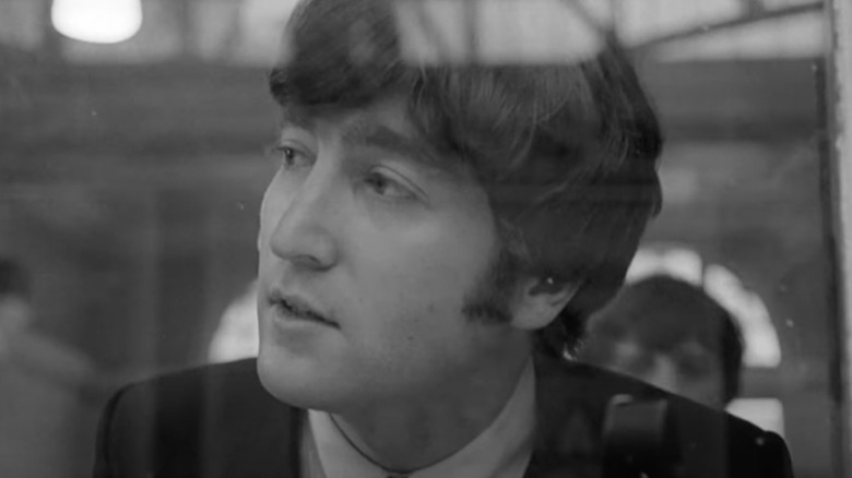 John Lennon watching