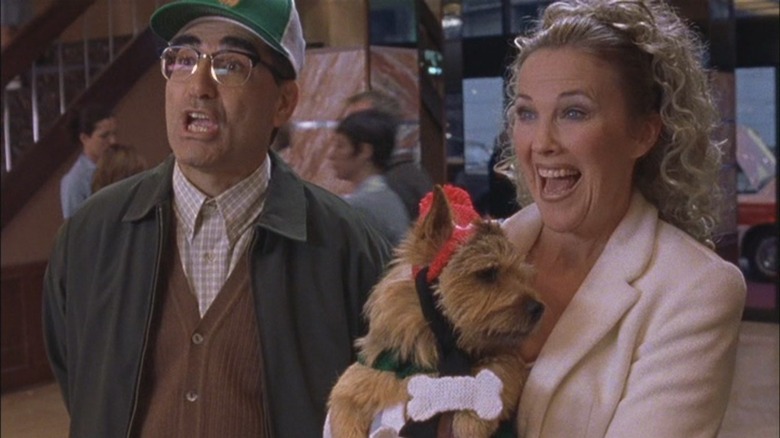 Eugene Levy and Catherine O'Hara with dog