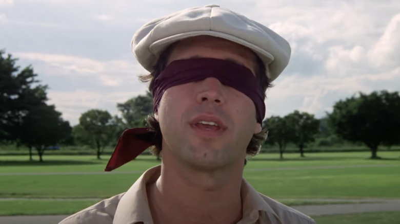 Chevy Chase blindfolded