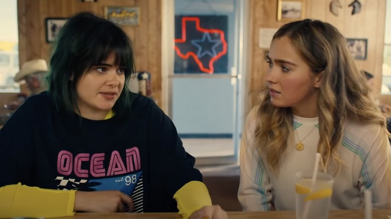 Haley Lu Richardson and Barbie Ferreira talking in diner in Unpregnant