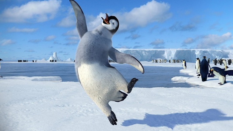 A CGI penguin stands mid-dance on an ice floe 