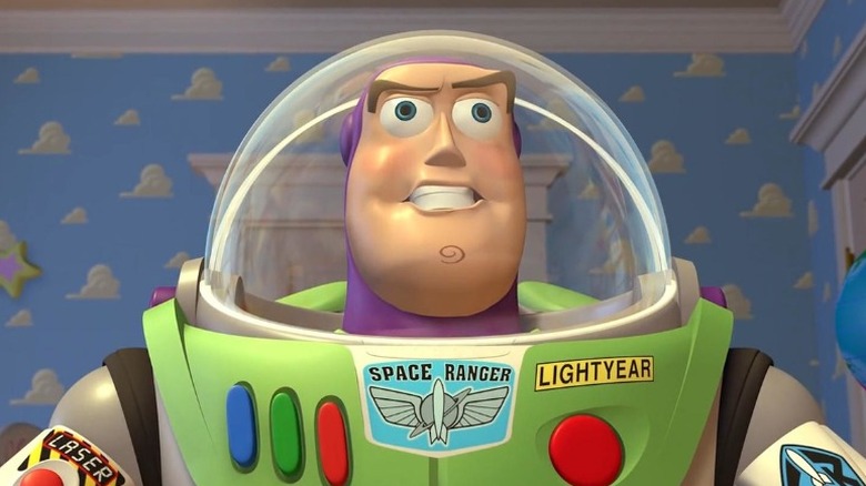 Buzz Lightyear standing with arms on hips