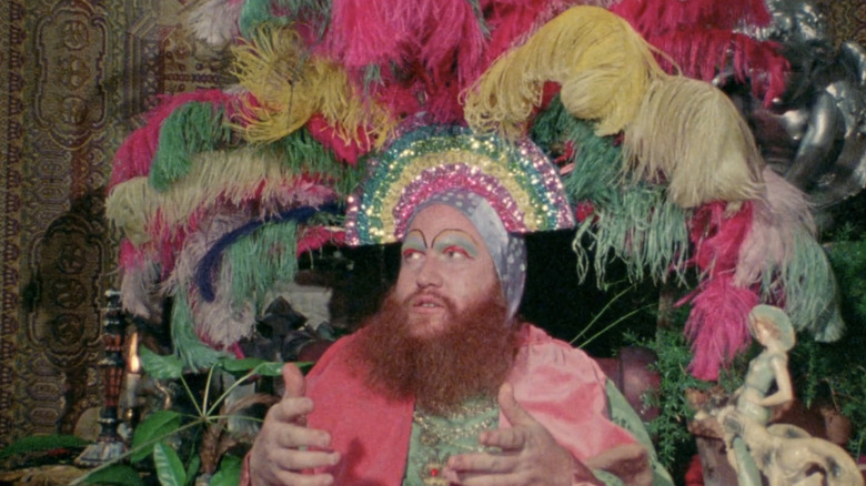 unnamed man in Mardi Gras costume