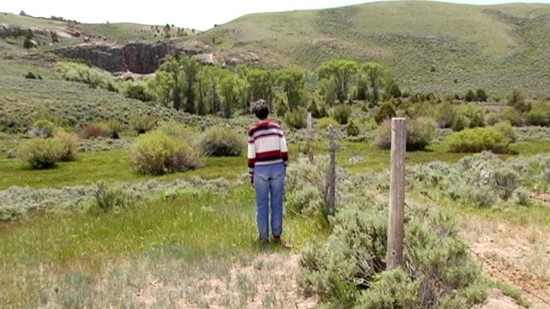 Woman standing in field