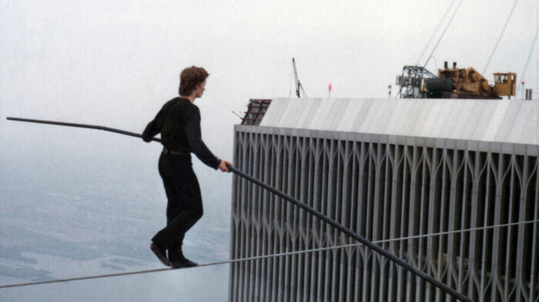 Philippe Petit walking on tightrope