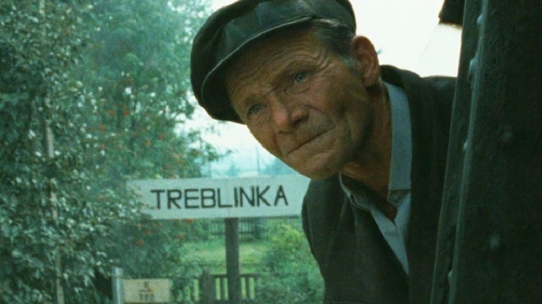 Henryk Gawkowski leans out train