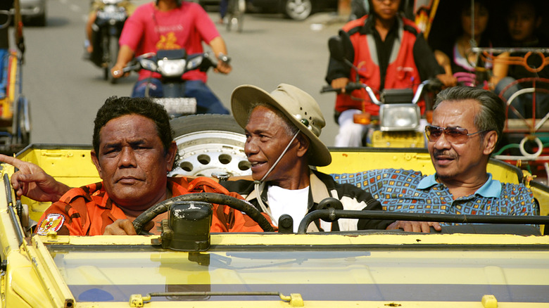 Anwar Congo riding with associates