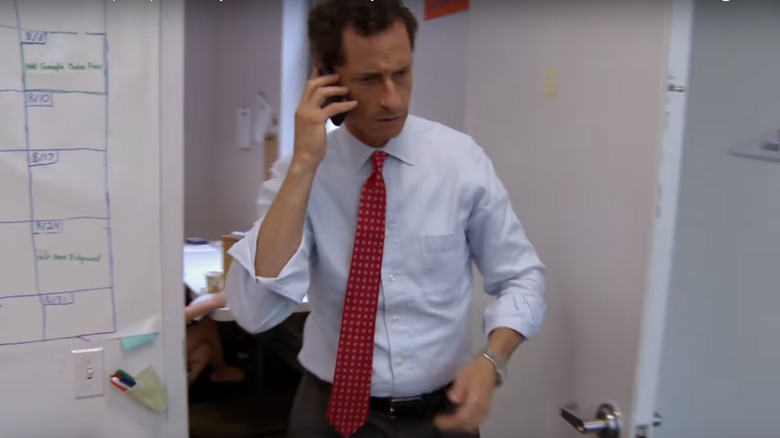 Anthony Weiner talking on phone