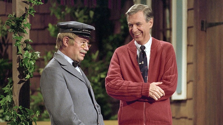 Mr. Rogers laughing with Mr. McFeely