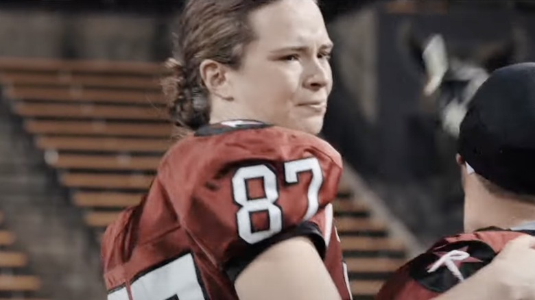 Female football player walking