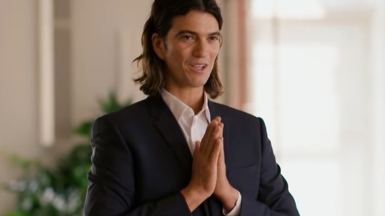 Adam Neumann folding hands