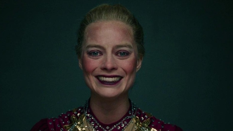 Margot Robbie smiles as Tonya Harding