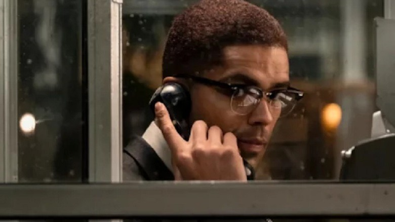 Malcolm X using payphone