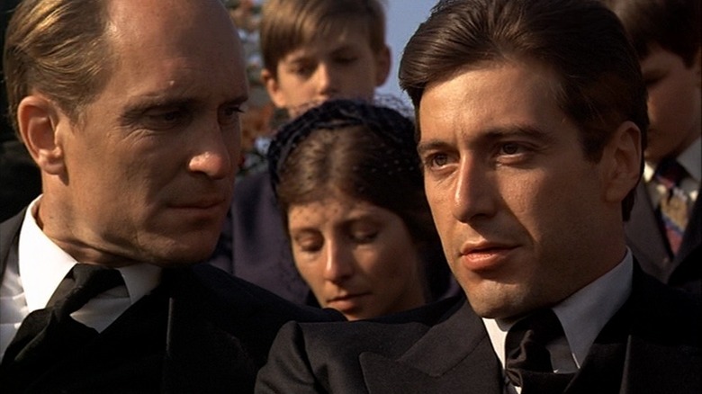 Michael Corleone and Tom talking at funeral