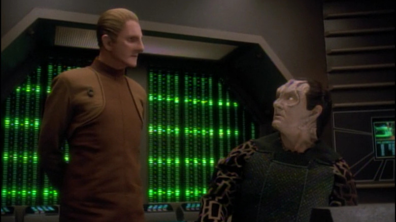 Odo speaks to Garak