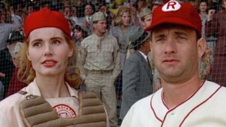 Tom Hanks and Geena Davis playing baseball