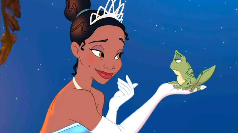 Tiana holding frog