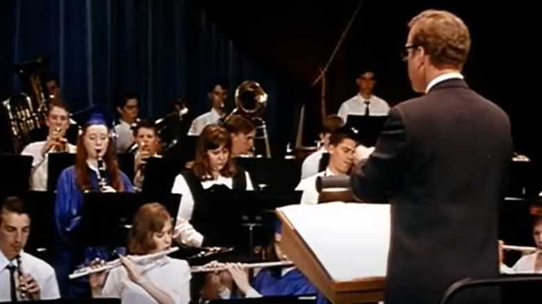 Mr. Holland conducting school orchestra