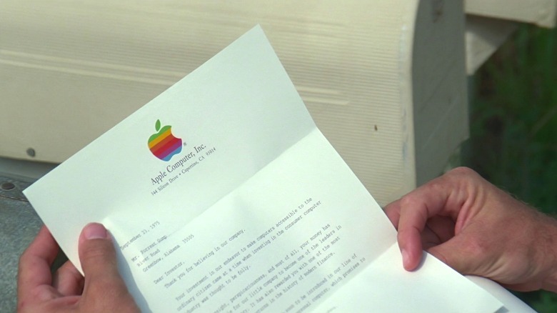 Forrest Gump holding Apple letter