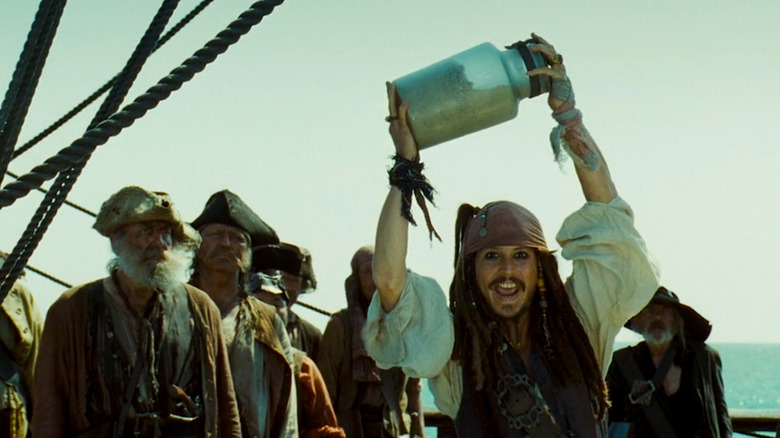 Jack Sparrow holds up jar