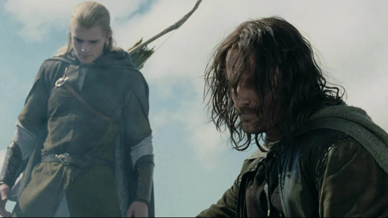 Aragorn and Legolas in despair