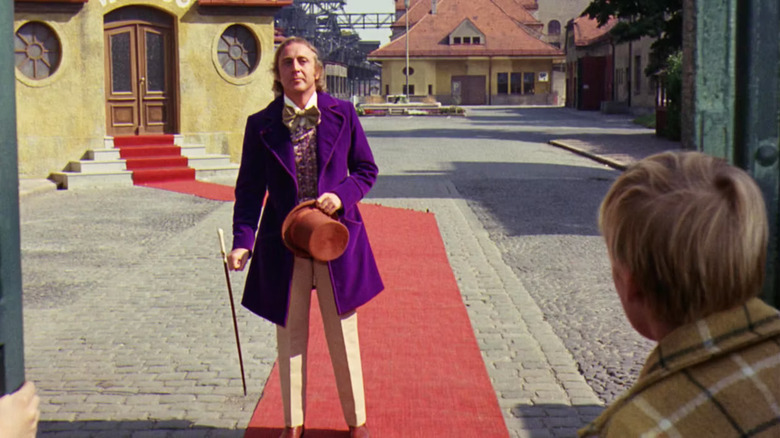 Willy Wonka greets his guests