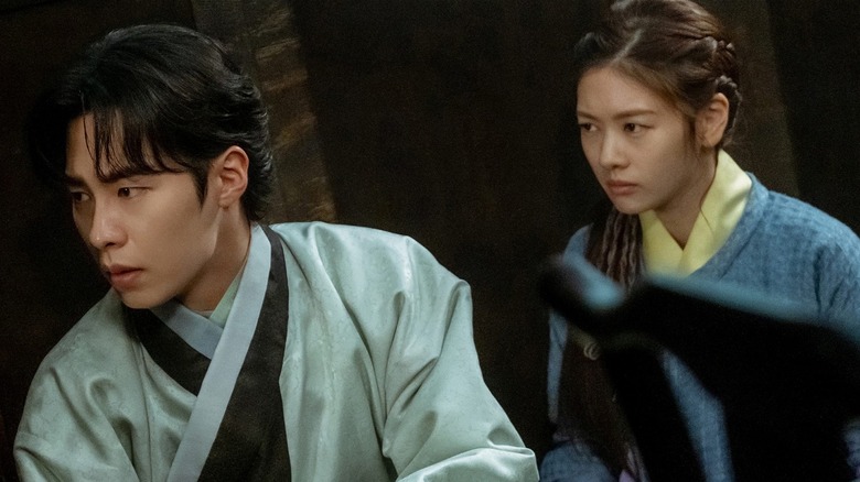 Lee Jae-wook and Jung So-min looking at something