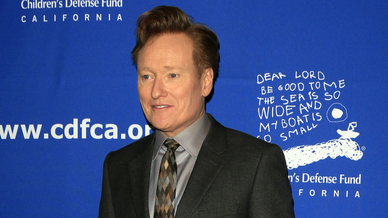 Conan O'Brien against blue background