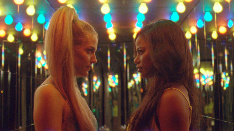 Riley Keough and Taylour Paige looking 