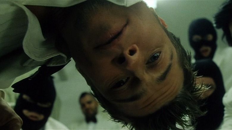 Tyler Durden leans over