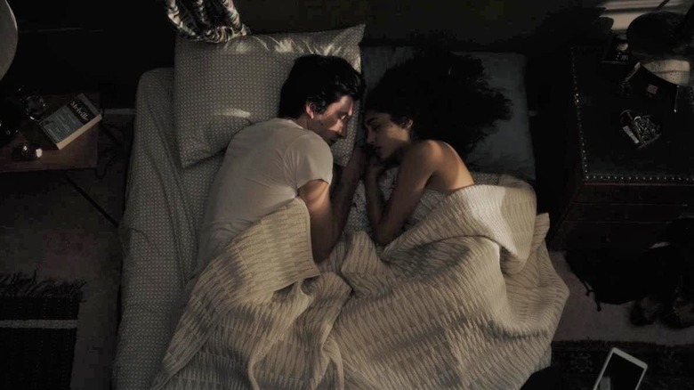 Paterson and Laura in bed together