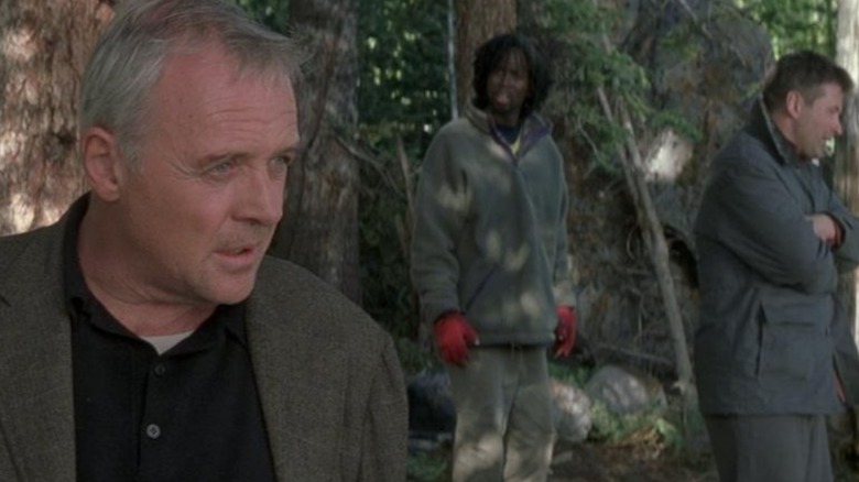 Anthony Hopkins, Alec Baldwin, and Harold Perrineau in The Edge