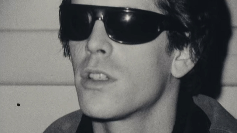 Lou Reed wearing sunglasses