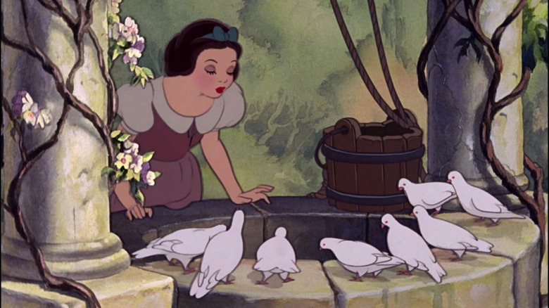 Snow White singing into well