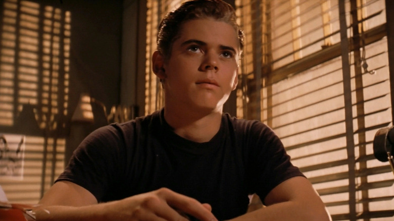 Ponyboy Curtis sitting